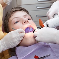 Child receiving dental care