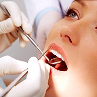 Close up of woman having teeth cleaning 