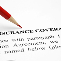 Insurance coverage policy and red pencil