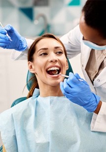 a patient undergoing a dental checkup near Geneva