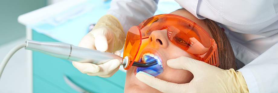 Woman getting a tooth-colored filling